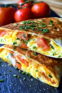 Frühstückswrap mit Ei, Käse und Tomaten