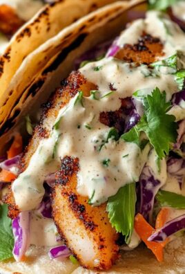 Kabeljau Tacos mit würziger Slaw und cremiger Sauce